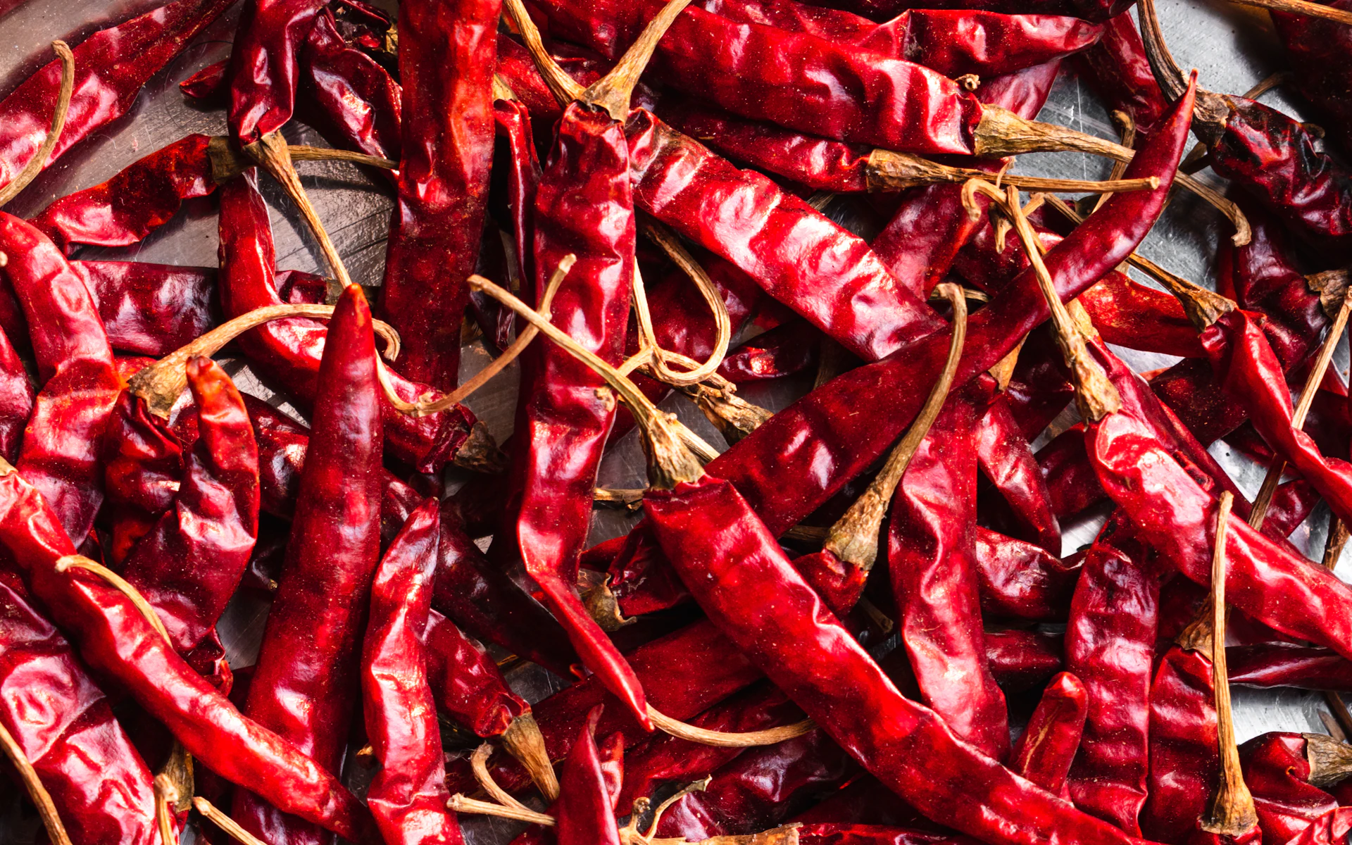A heap of bright red dried chillies